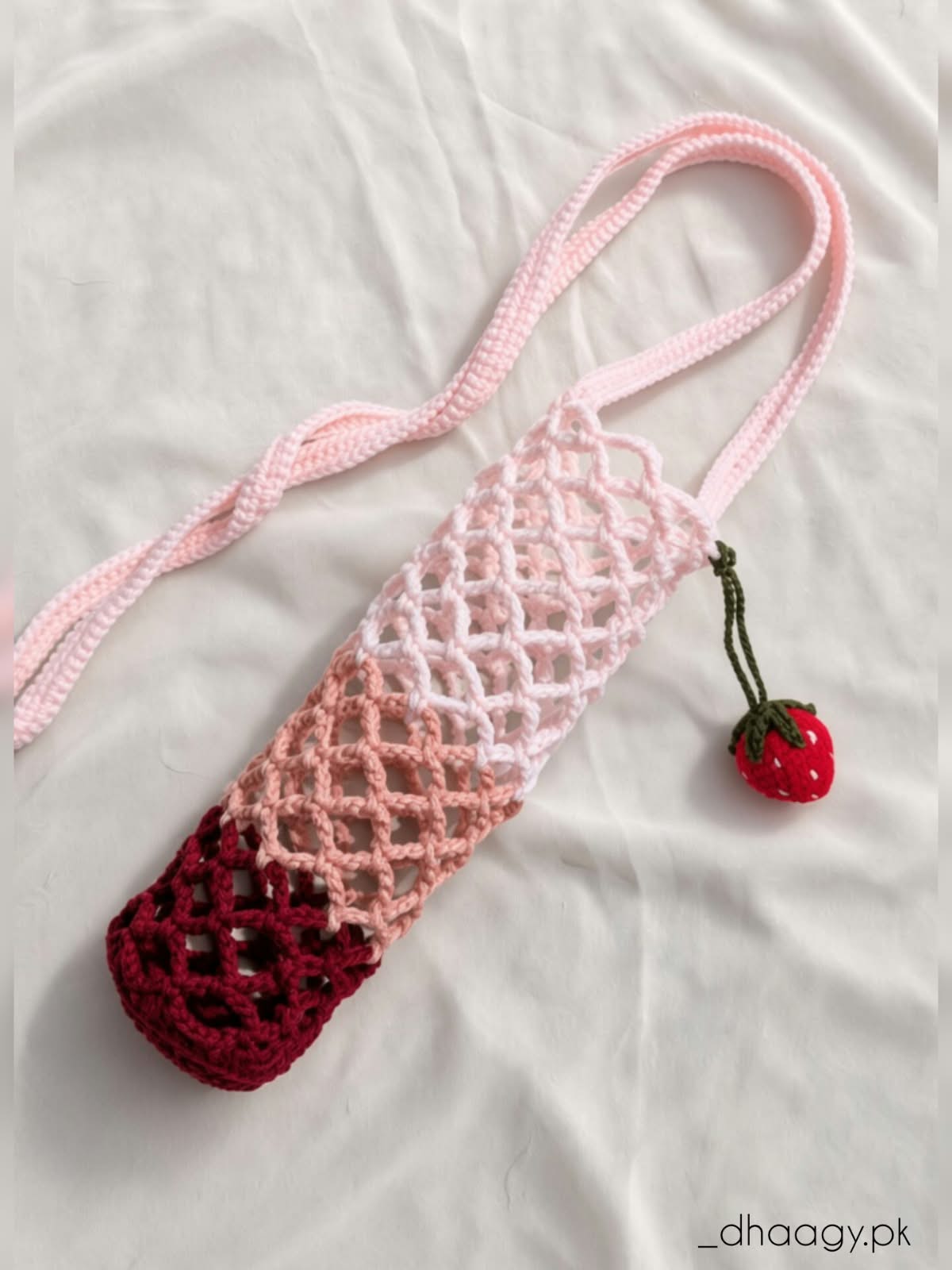 The Crochet Bottle Holder with Strawberry charm